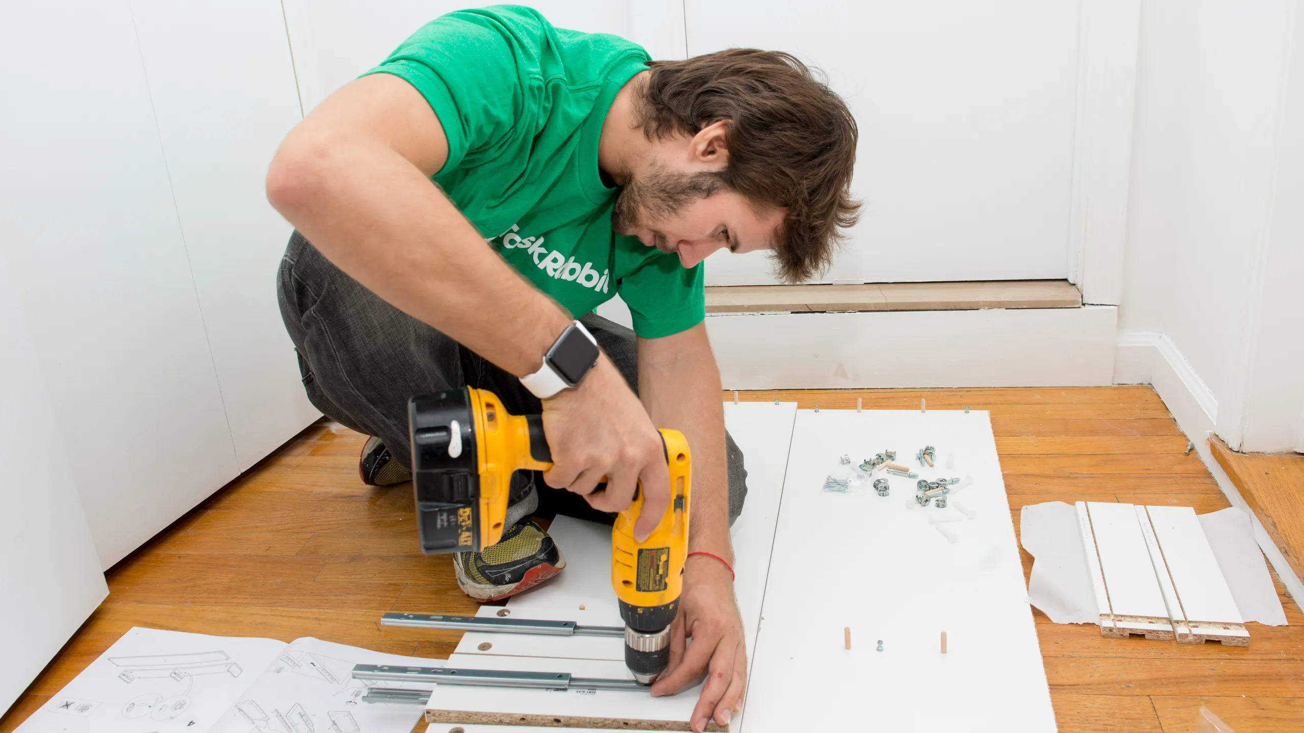 Ikea installer London assembling a wardrobe with aligned doors and professional tools