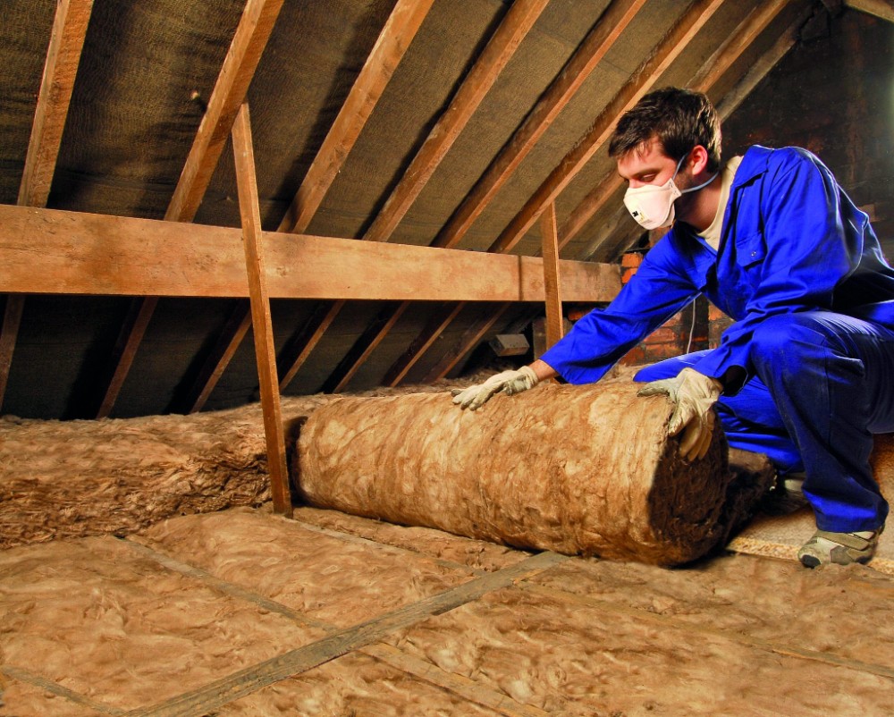 Loft insulation installers Westminster - SW1 - insulation being laid evenly in loft